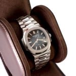 Banksy print, luxury watch and vintage Ford Model T representing cross-category collecting