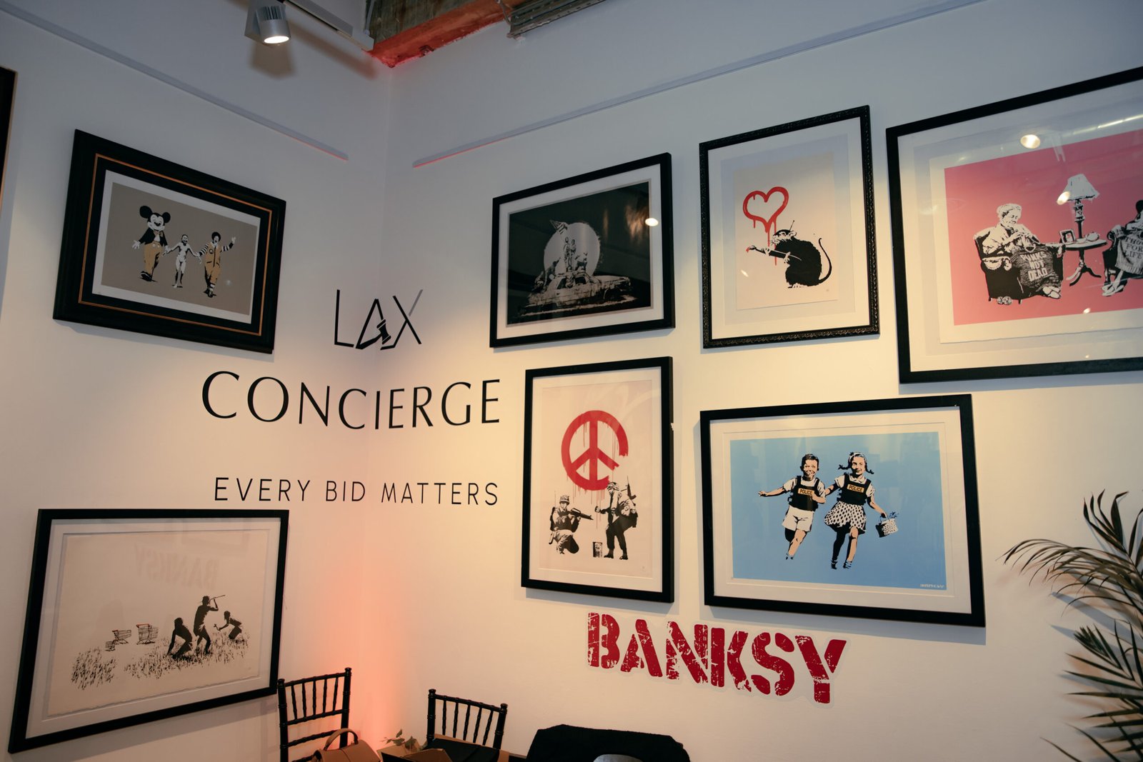Banksy print, luxury watch and vintage Ford Model T representing cross-category collecting